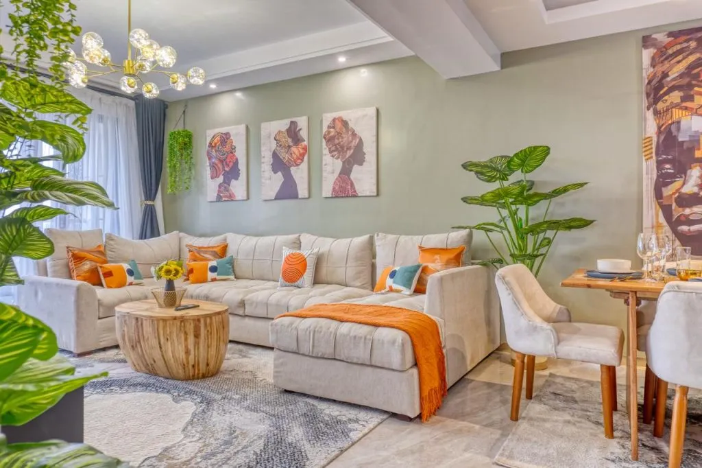 best airbnb in nairobi — stylish living room with African art and modern furnishing