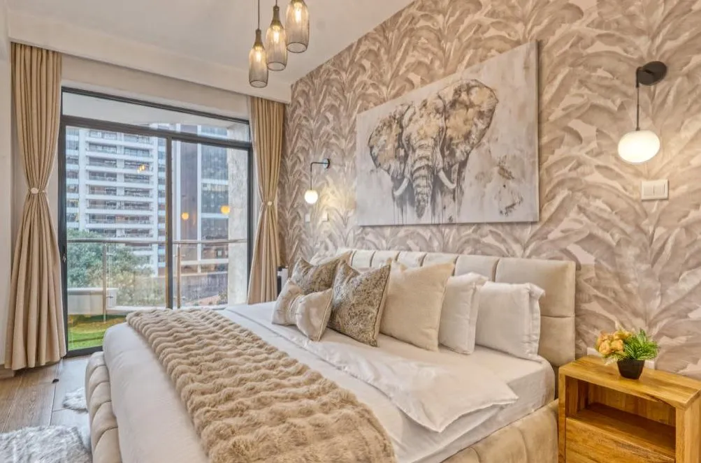 airbnb bedroom setup nairobi with quality mattress and blackout curtains